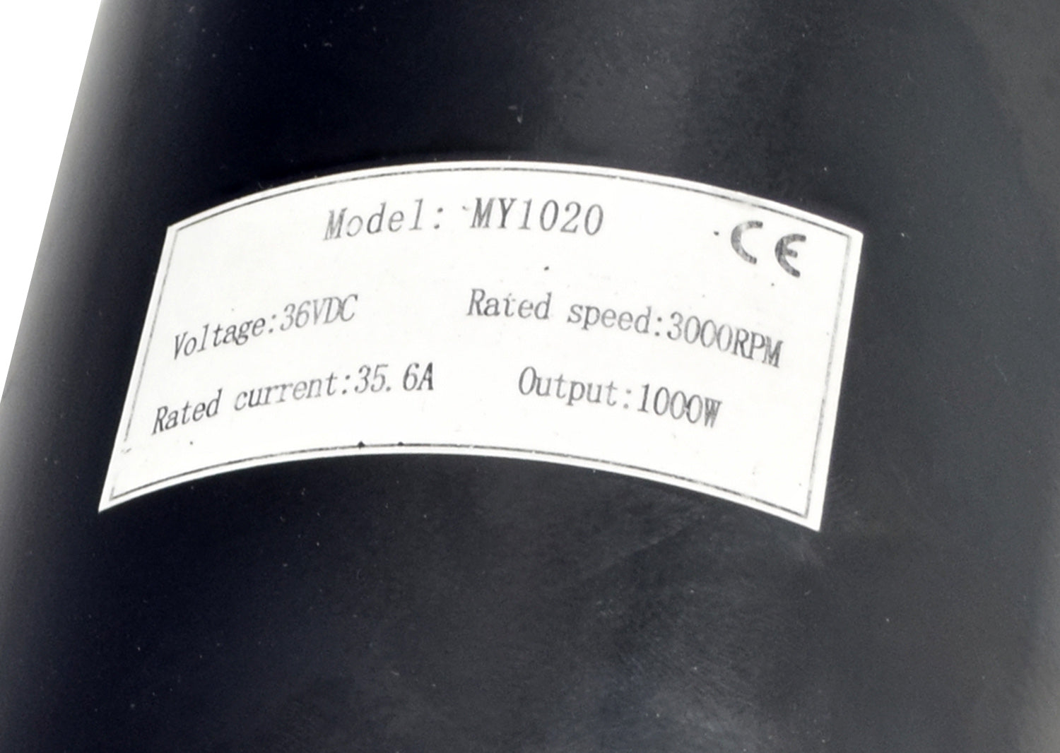 36 Volt 1000 Watt Motor, Controller, & Throttle Kit for Scooters, Bikes, & Go-Karts featuring a white label with black text on a black surface, highlighting key specifications of the motor and components.