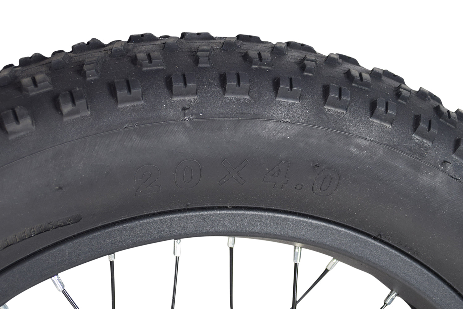 Close-up of a 20x4.0 Rear Wheel Assembly with 350W Hub Motor for the Swagtron EB6 Bandit Fat Tire Electric Bike, showing the tire's directional knobby tread and part of the rim.