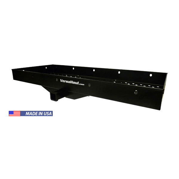 Heavy Duty Steel Cargo Tray with multiple holes, white text, and a hinge on a black metal surface. Designed for Class III or IV hitches, featuring a durable powder coat finish and anti-tilt locking bracket.