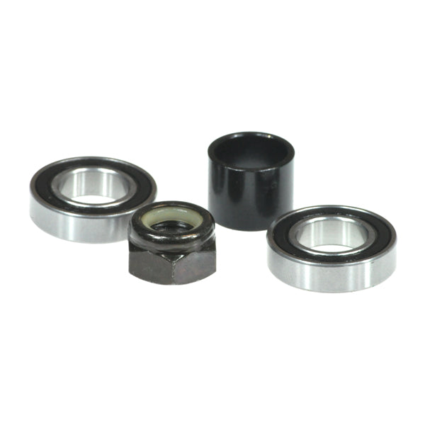 Caster Anti-Flutter Kit for the Jazzy 614 and 614 HD Power Chairs, showing close-ups of two bearings, a black cylinder bushing, and a nylon lock nut essential for caster assembly repairs.