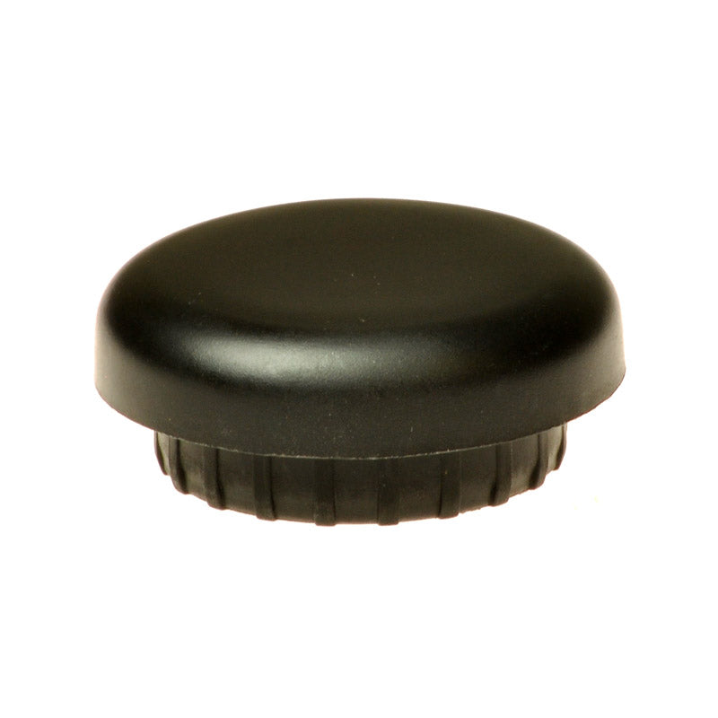 Caster Fork Dust Cover for the Golden Technologies Compass (GP600) power chair, a round object with a black cap designed to protect fork bearings from dirt and moisture.