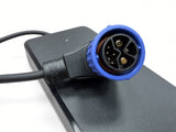 Close-up of the blue 8-pin connector on the Coleman EVB200 60 Volt battery charger