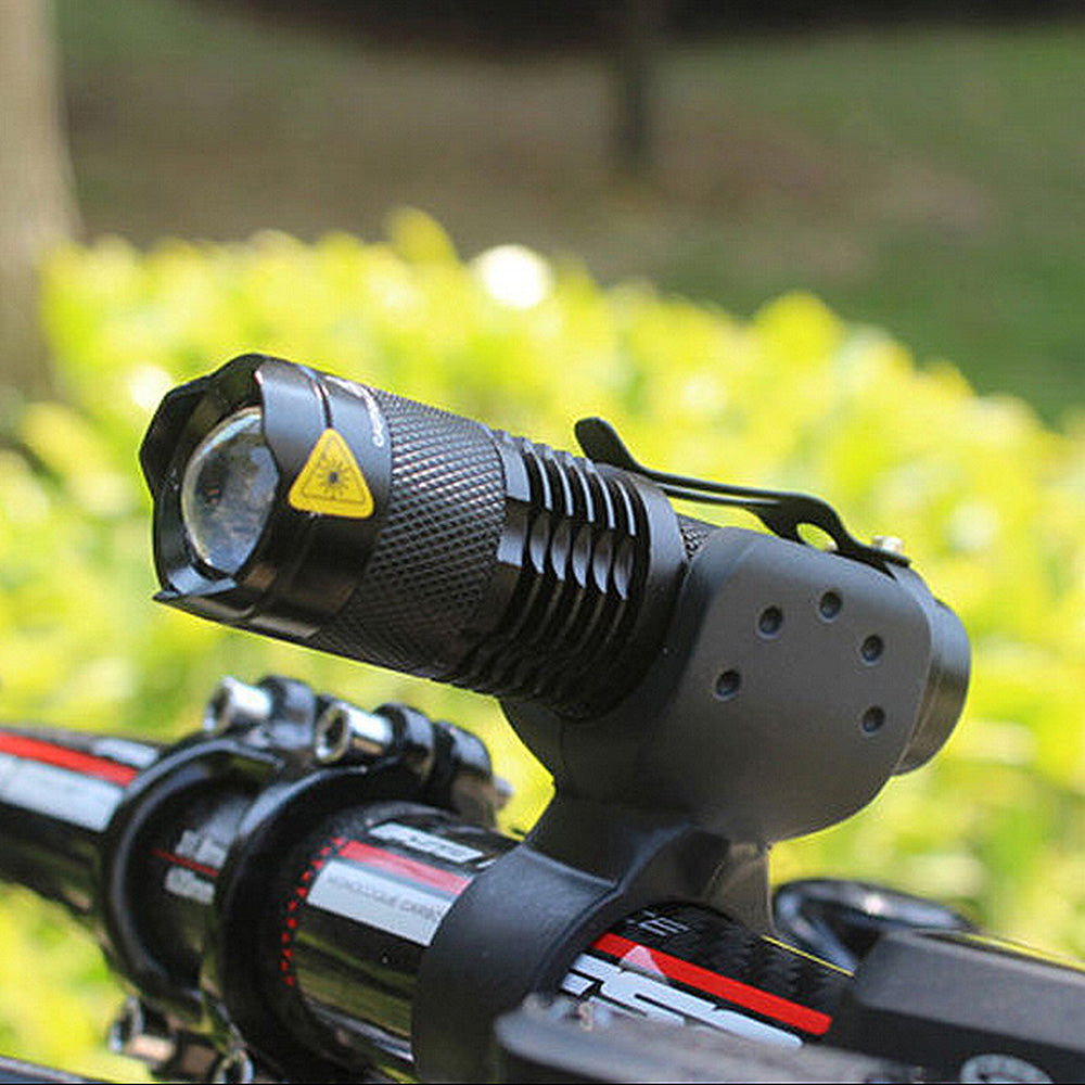 Cree Q5 UltraFire Aluminum LED Handlebar Light for Bikes & Scooters mounted on a bicycle handlebar, showcasing its robust design and adjustable 360-degree bracket.