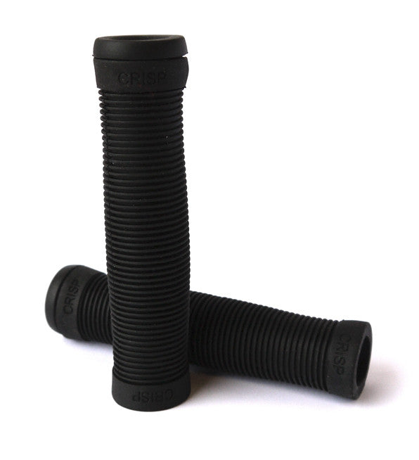 Crisp Kick Scooter Grips featuring a pair of molded black handles with freestyle ridges for increased comfort and grip, including two bar ends. Ideal for professional scooterists seeking high-quality performance.