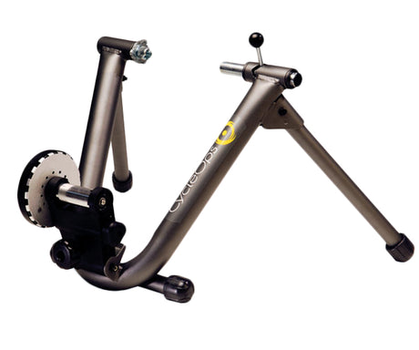 CycleOps 9901 Mag Bicycle Trainer featuring a sturdy frame, adjustable resistance settings, and a spring-loaded skewer clamp for easy bike installation, shown on a white background.