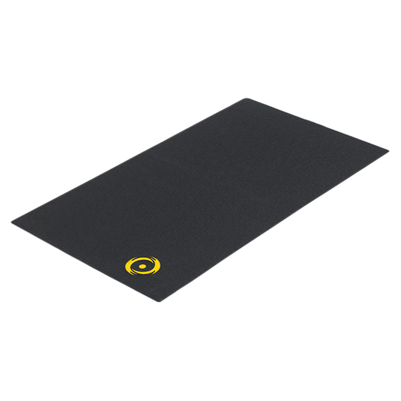 CycleOps Bicycle Trainer Mat featuring a black surface with a prominent yellow circle, designed to protect floors, absorb vibration and noise, and prevent movement during indoor bike training sessions.