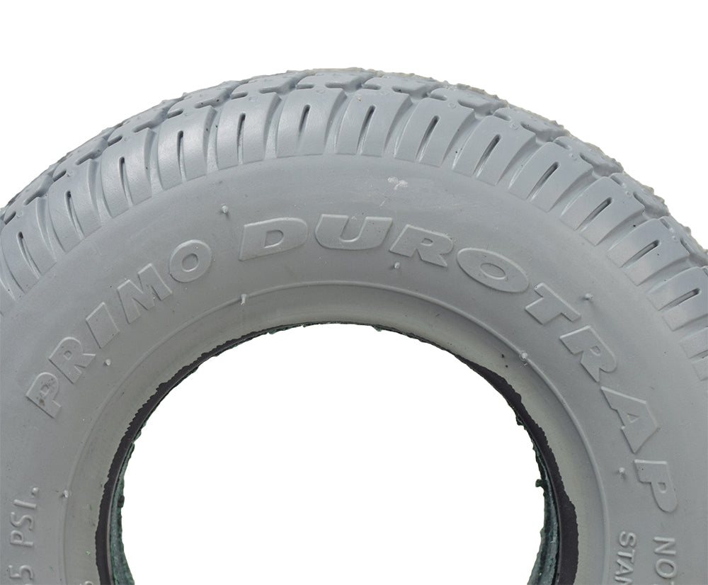 Close-up of an 8x2 (200x50) foam-filled mobility tire with IA-2817 tread, featuring a smooth profile and in-cut tread pattern designed for efficient rolling on hard surfaces.