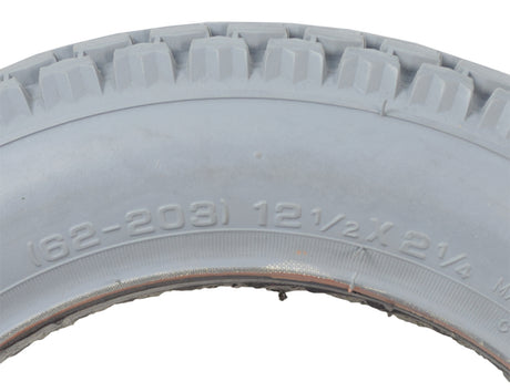 12-1/2x2-1/4 Foam-Filled Mobility Tire with C628 Knobby Tread; close-up showing grey rubber with detailed tread, suitable for mobility scooters and power chairs, non-marking, no inner tube needed.