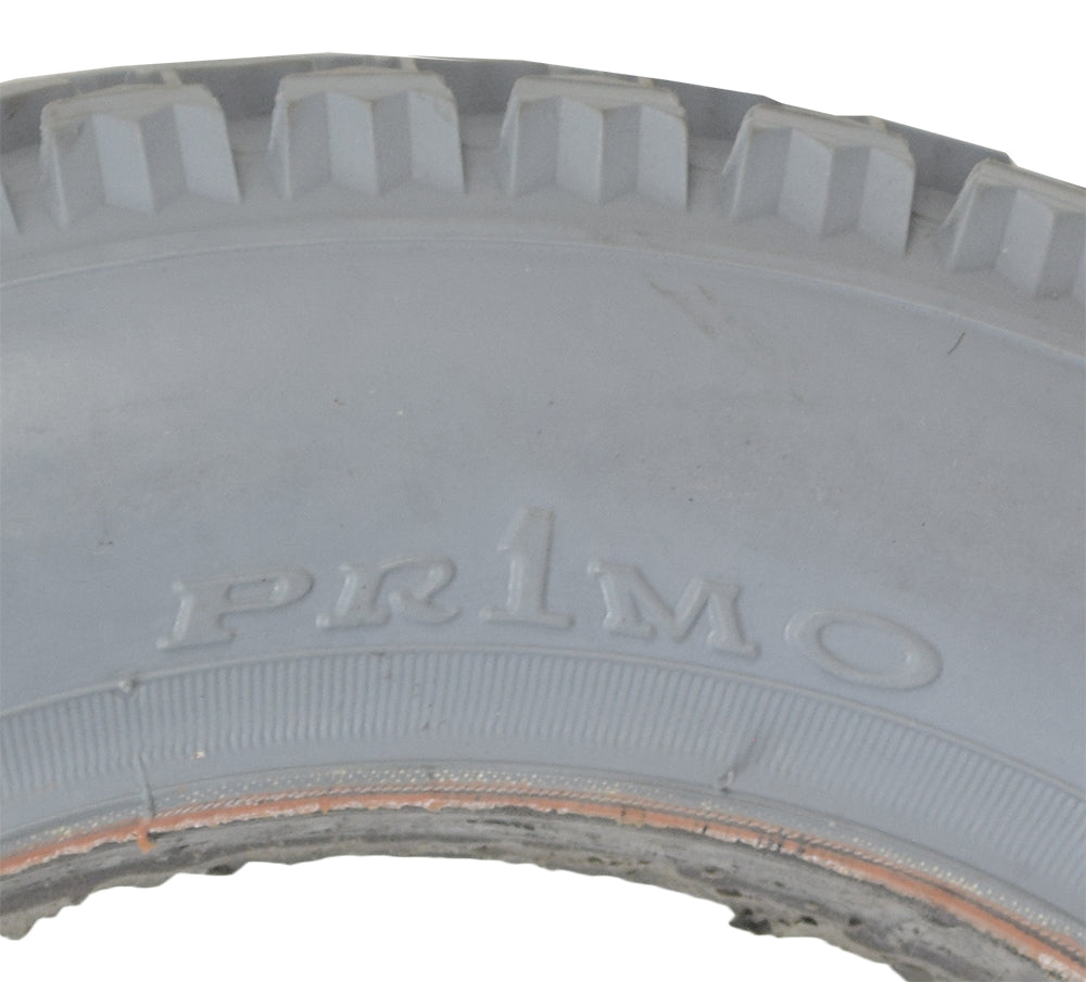 Close-up of the 12-1/2x2-1/4 Foam-Filled Mobility Tire with C628 Knobby Tread, showcasing its detailed tread pattern suitable for mobility scooters and power chairs.