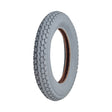 12-1/2x2-1/4 Pneumatic Mobility Tire with C628 Power Express Tread, close-up view showing the knobby tread pattern and central hole for fitting, ideal for a smooth and cushioned ride.