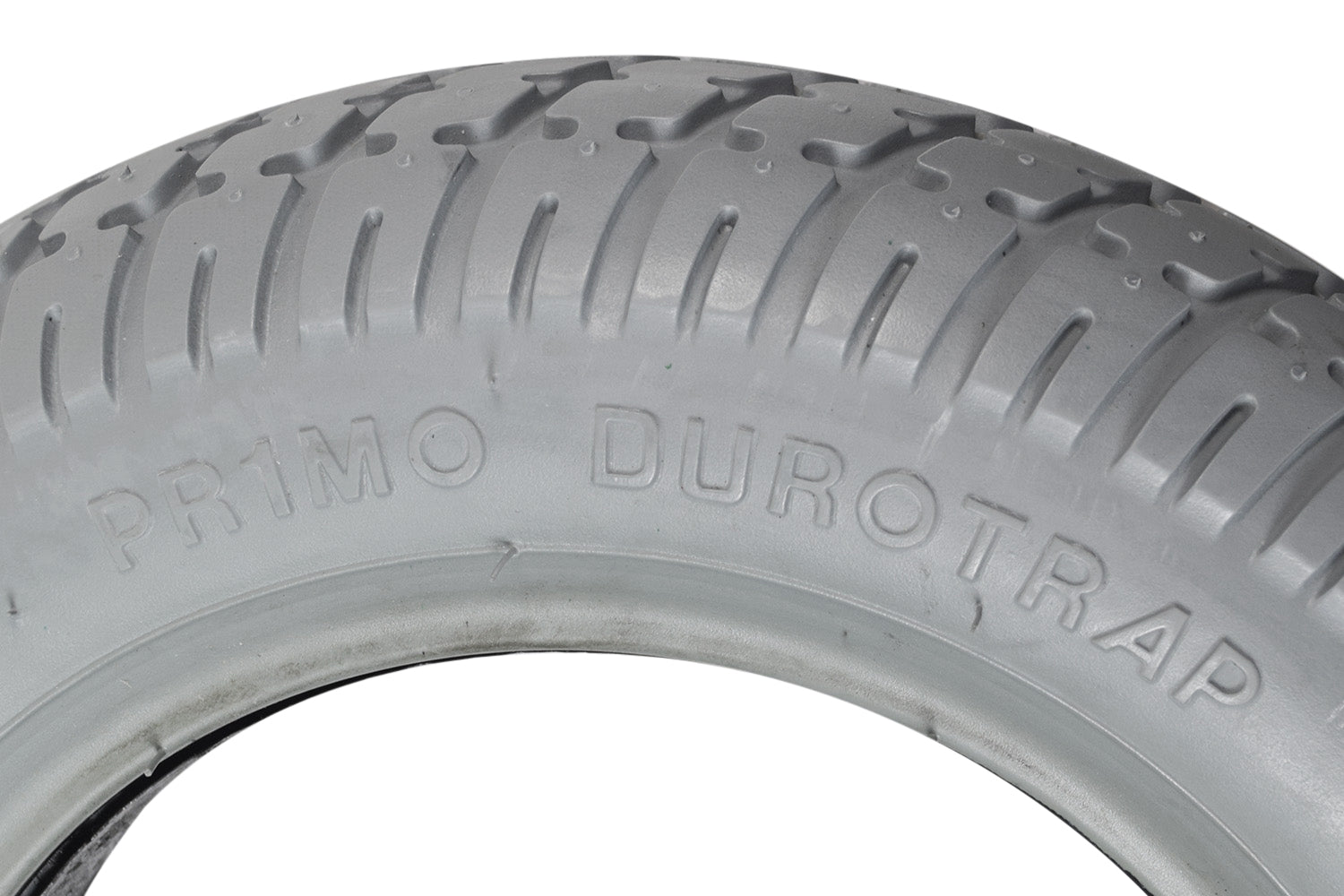 Close-up of a Primo 14x3 (3.00-8) foam-filled mobility tire with C9210 Durotrap tread, featuring a flush profile and 2.25 bead width, suitable for Jazzy and Jet power chairs.