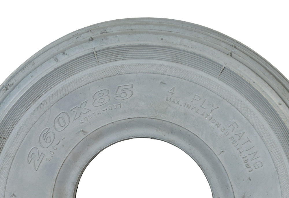 Close-up of the 10x3 (3.00-4, 260x85) Pneumatic Mobility Tire with K301 Ribbed Tread, highlighting its ribbed pattern and durable, non-marking rubber construction for mobility scooters and power chairs.