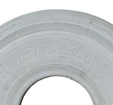 10x3 (3.00-4, 260x85) Pneumatic Mobility Tire with K301 Ribbed Tread, shown as a white tire with text and a hole in the middle, designed for scooters.