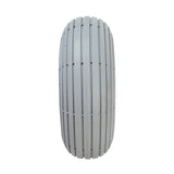 3.00-4 (10x3, 260X85) Foam-Filled Mobility Tire with K301 Ribbed Tread. This front tire for mobility scooters features vertical slats, ensuring durability and comfort.