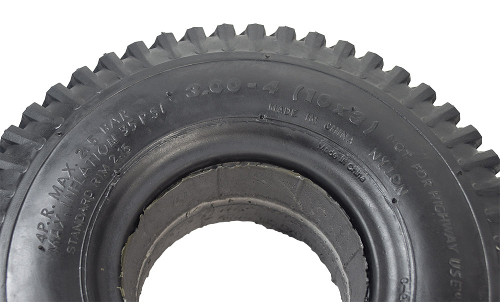 3.00-4 (10x3, 260X85) Foam-Filled Mobility Tire with Powertrax C248 Turf Tread, black tire with circular rim, designed for older-style mobility scooters and power chairs.