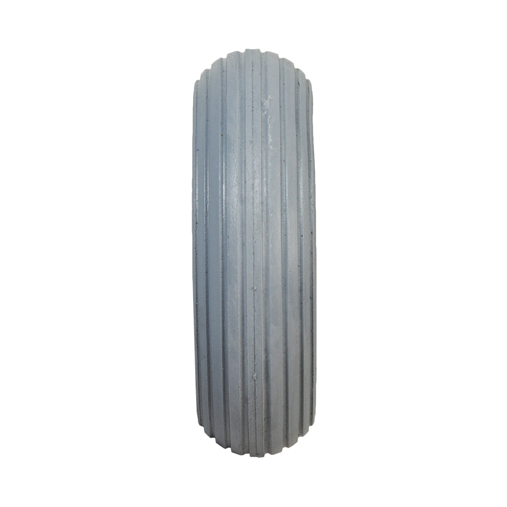 7x2 Light Gray Solid Urethane Mobility Tire with Ribbed Tread, shown in a close-up, emphasizing its durable, flat-free design.