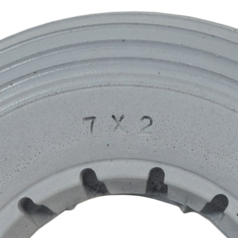 7x2 Light Gray Solid Urethane Mobility Tire with Ribbed Tread, shown as a circular object with a number on it, designed for reliable, flat-free performance.