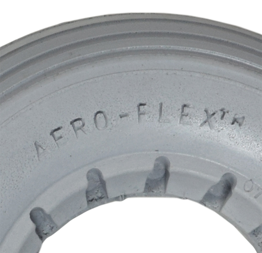 Close-up of the 7x2 Light Gray Solid Urethane Mobility Tire with Ribbed Tread, showcasing its flat-free, latex-free solid urethane construction and detailed ribbed surface, designed for dependable mobility.