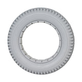 14x3 (3.00-8) Light Gray Solid Urethane Mobility Tire with Knobby Tread for Quickie Power Chairs, featuring a white tire with a central hole and knobby tread pattern.