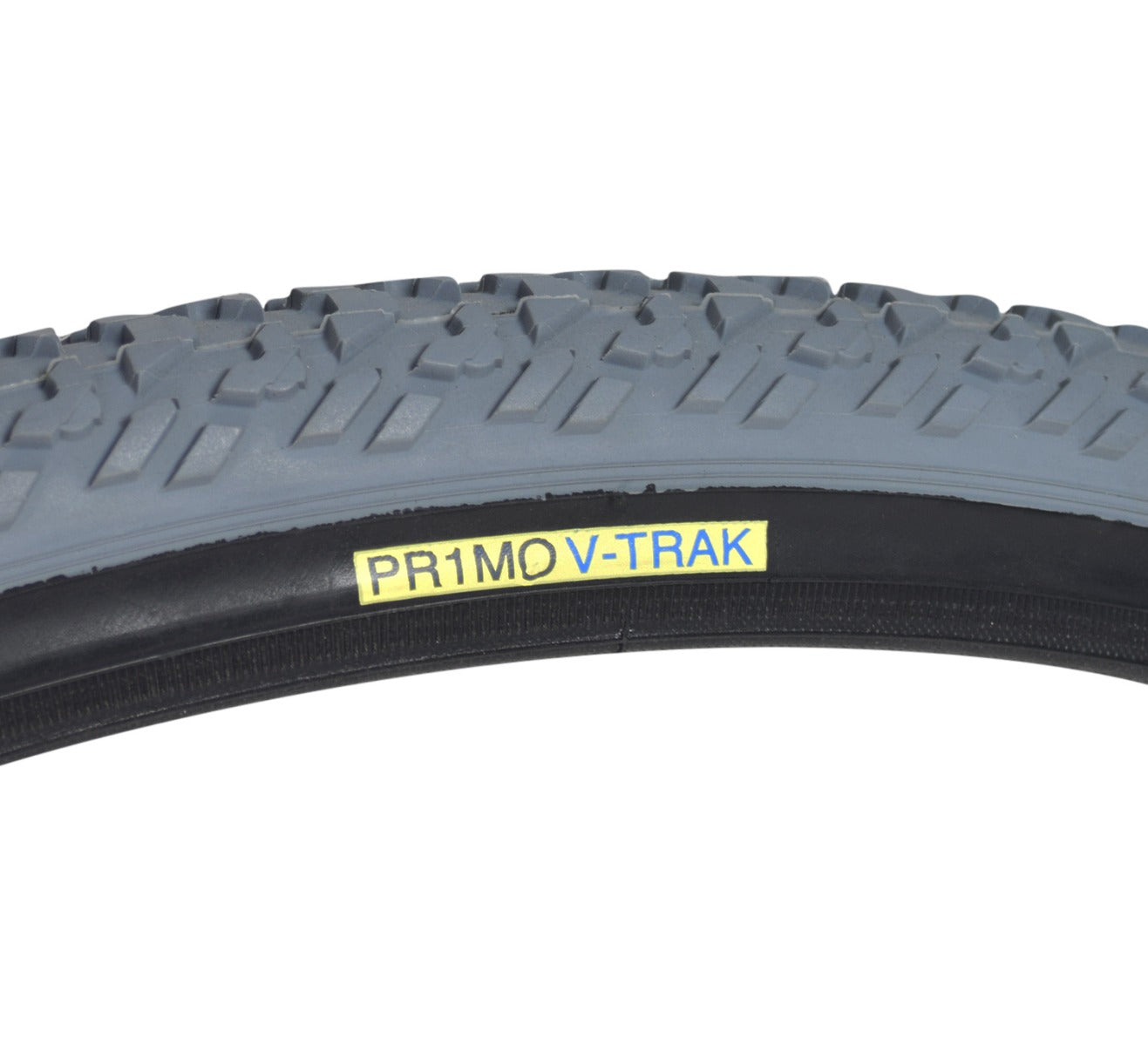 Close-up of the 24x1-3/8 Gray Pneumatic Wheelchair Tire with C763 Tread, highlighting the knobby tread pattern and durable, non-marking rubber suitable for both indoor and outdoor use.