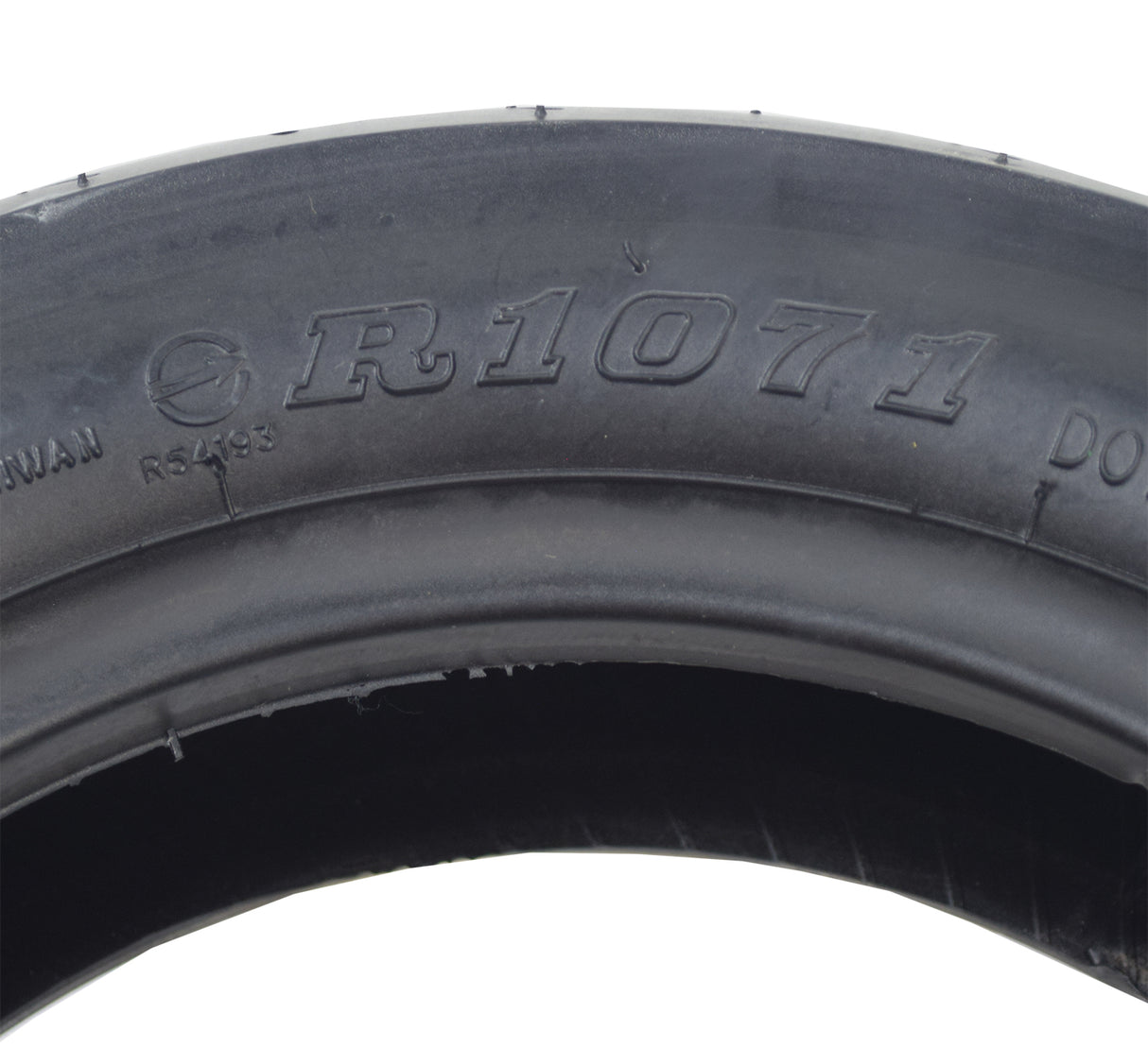 Close-up of the 100/80-10 Tubeless Pneumatic Front Tire for the Drive Medical King Cobra Mobility Scooter, showcasing its shallow street tread design, ideal for smooth rides on hard surfaces.