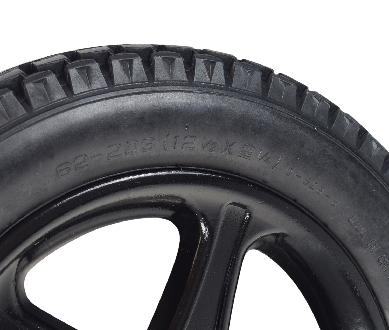 Close-up of the 12-1/2x2-1/4 Solid Urethane Rear Wheel Assembly for Drive Cirrus Plus EC Power Chair, showcasing the tire's tread and non-split rim, designed for flat-free safety and performance.