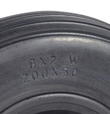 Close-up of an 8x2 (200x50) front caster wheel for the Drive Sentra EC Heavy Duty Bariatric Wheelchair, showcasing its detailed tread and rubber texture.