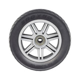 8x2 (200x50) Black Flat-Free Front Wheel Assembly for Drive Medical Spitfire Scout DLX 4-Wheel Scooter, featuring a silver rim and heavy tread.