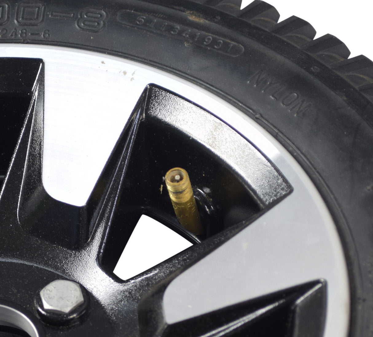 3.00-8 Rear Wheel Assembly for the Drive Cobra GT4, featuring a close-up of the pneumatic tire with detailed tread and a visible brass valve stem, designed for mobility scooters.