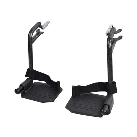 Footrest Assembly Set (Left & Right) for the Drive Medical Steel Transport Chair (TR39E-SV) showing a pair of black foot pedals with pivoting footplates, heel straps, and quick-release latches.