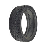 11x3.5 (90/40-8) Front Tire for the Drive Medical Odyssey GT, showcasing a black low profile design with shallow-siped street tread pattern, ideal for the scooter's front wheels.