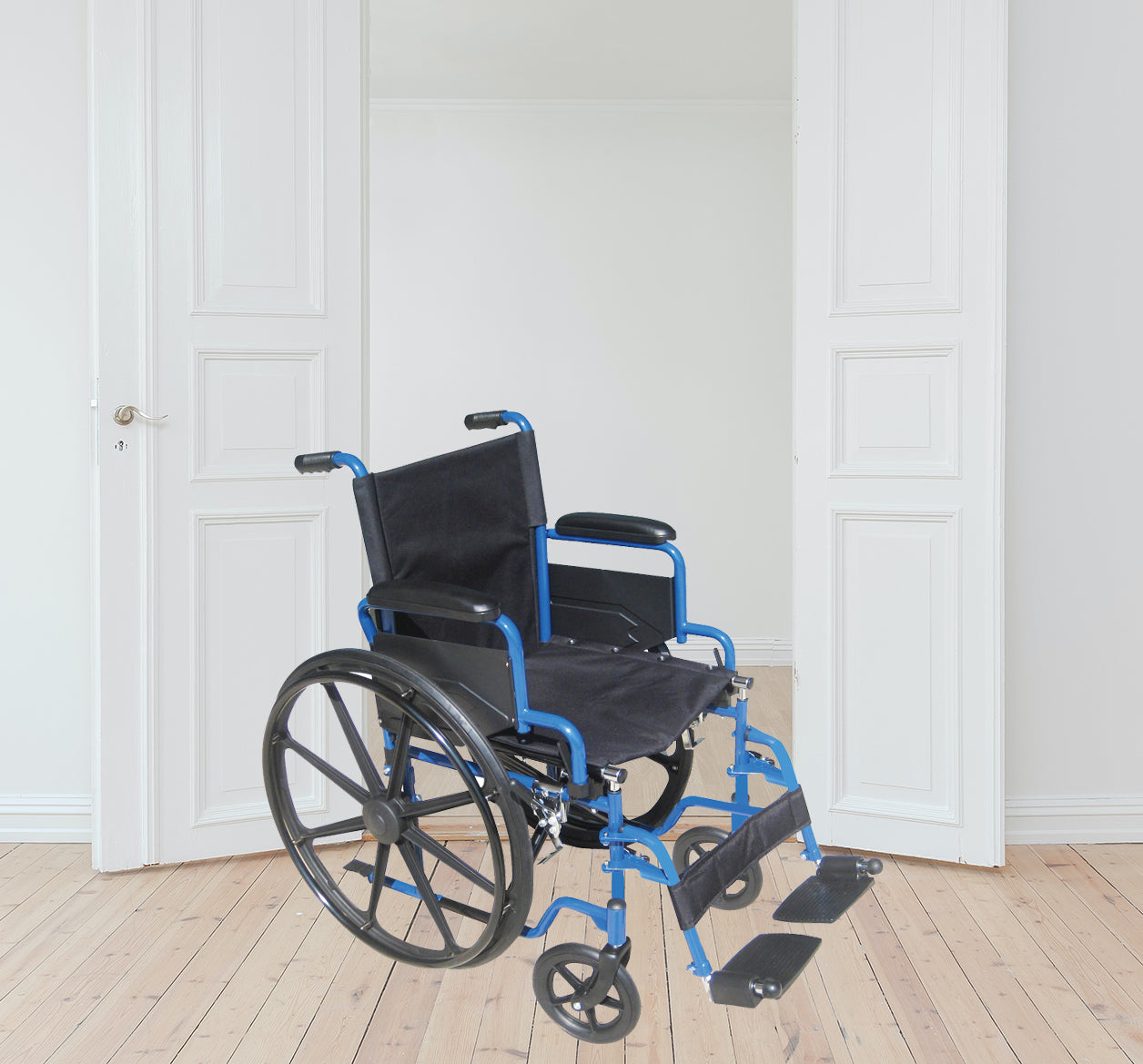 Universal Footplate for the Drive Medical Blue Streak Wheelchair, shown attached to a wheelchair in a room, featuring a textured surface for added grip and safety.