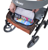 Tote Bag for the Drive Medical Nitro DLX & Nitro Elite CF Rollators, featuring a zippered vinyl flap over a mesh body, shown with a person opening it to reveal food items inside.