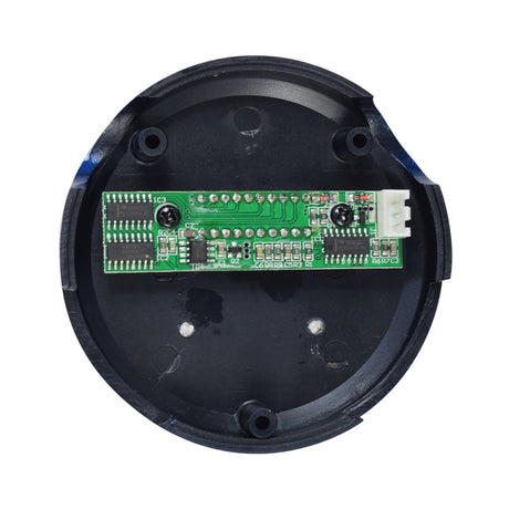 Upper Panel Assembly for the Drive Medical ZooMe Flex Scooter, featuring a green circuit board encased in a black round object with small components and a central LED display.