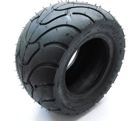 13x6.5-6 Pocket Bike Tire with central hole and prominent treads, compatible with various pocket and super pocket bikes.