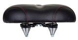 Deluxe Saddle Seat for Adult Trikes with a padded black top, red stitching, steel base, and coil spring suspension. The seat features metal legs and a black pillow, ideal for comfortable rides.