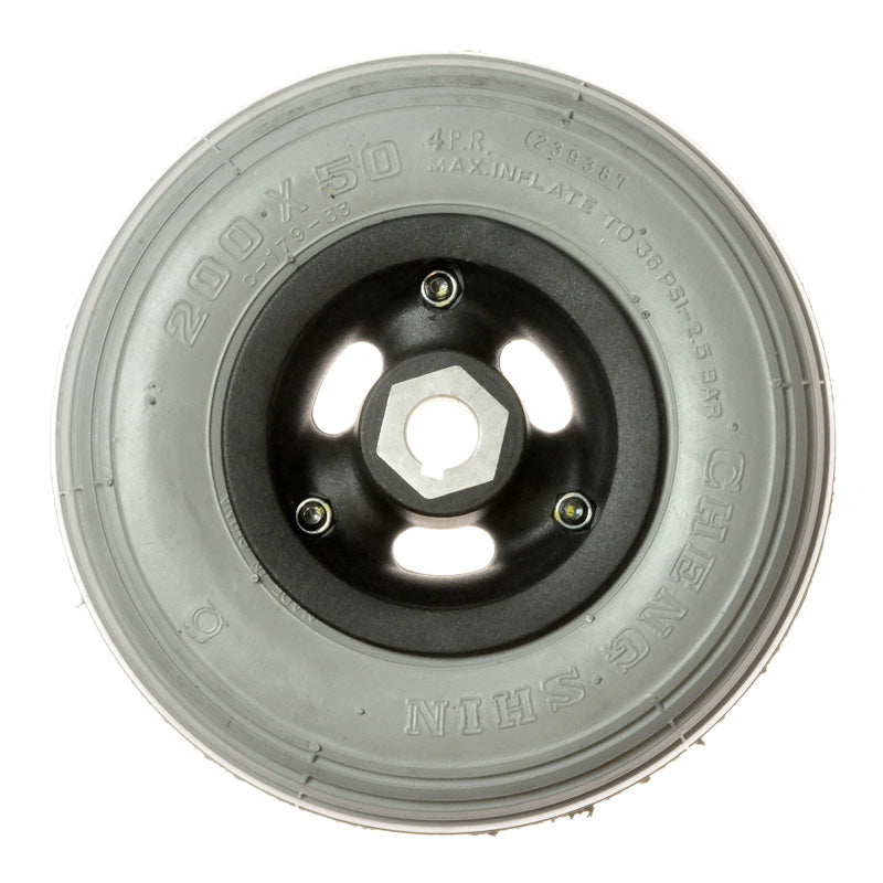 8x2 Drive Wheel Assembly for the Drive Geo Portable (S3500) Power Chair, featuring a central nut and a circular design, shown in a close-up view.