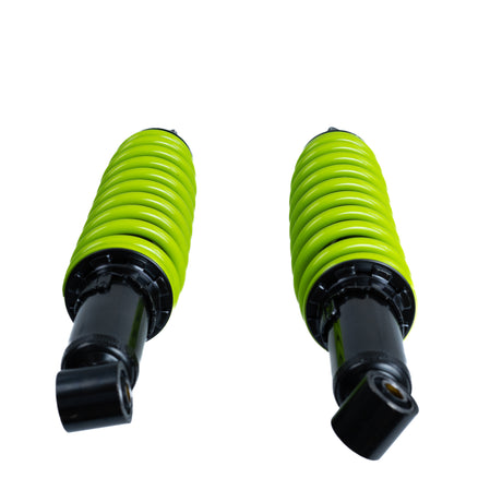 Front Shock Absorber for the Coleman AT200-B ATV (Set of 2), featuring green springs designed to ensure a smoother ride and proper maintenance for your ATV.