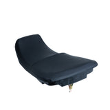 Seat for the Coleman AT200-B ATV, featuring black vinyl upholstery with a spring latch and clip for easy mounting. The seat is specifically designed as a replacement for torn or missing ATV saddles.