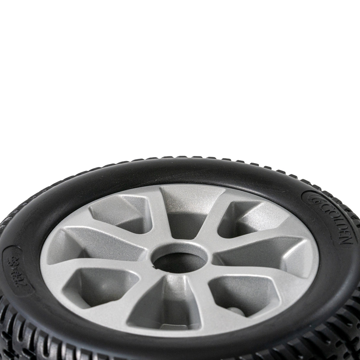 3.00-4 (10x3) black flat-free drive wheel for Golden Compass Sport power chair, featuring a black solid tire and silver rim, designed for newer models with an 11/16 axle.