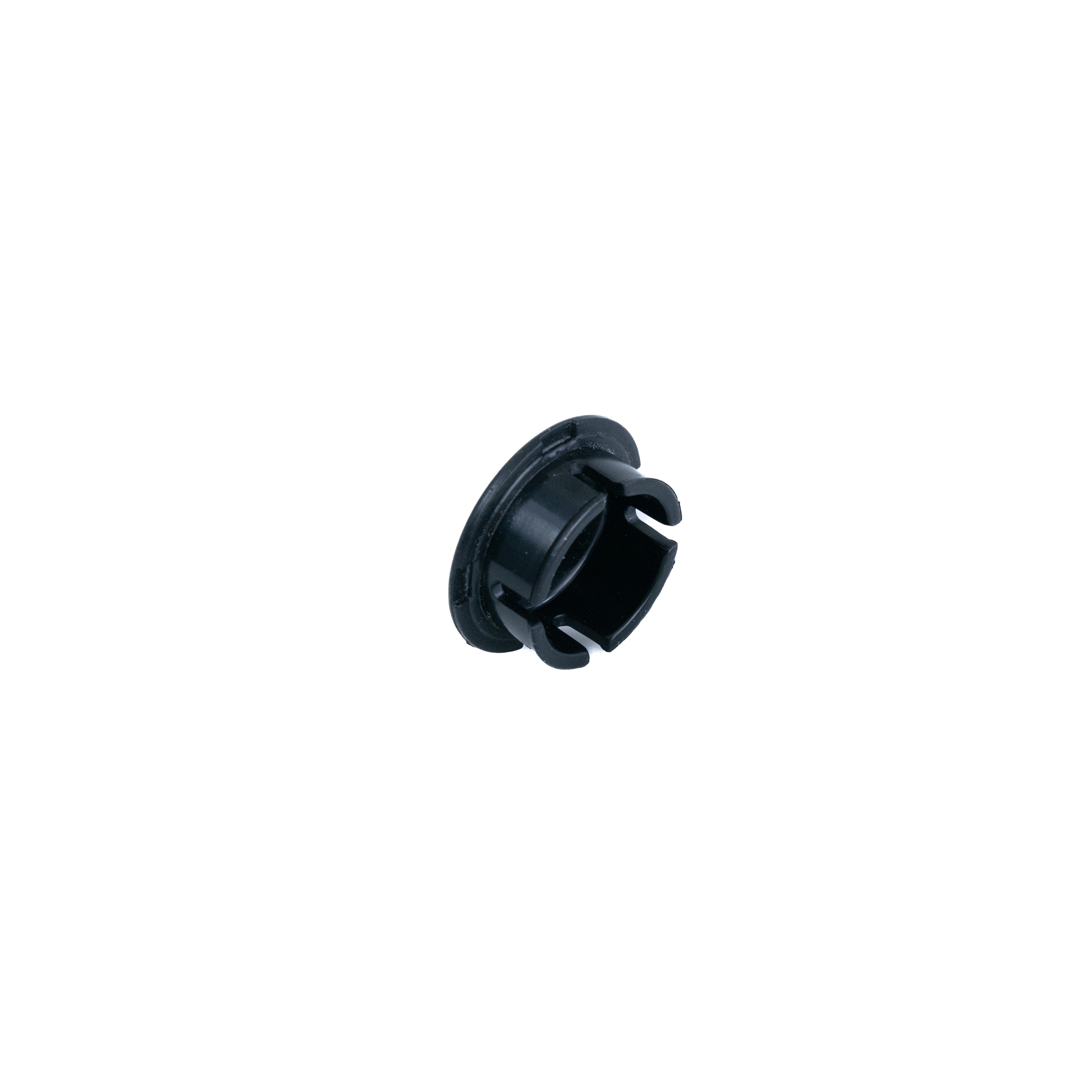 Caster Barrel Cap for the Jazzy Select GT, black plastic with a central hole, designed to seal fork assemblies and protect bearings from dirt and moisture, extending the caster wheels' life.