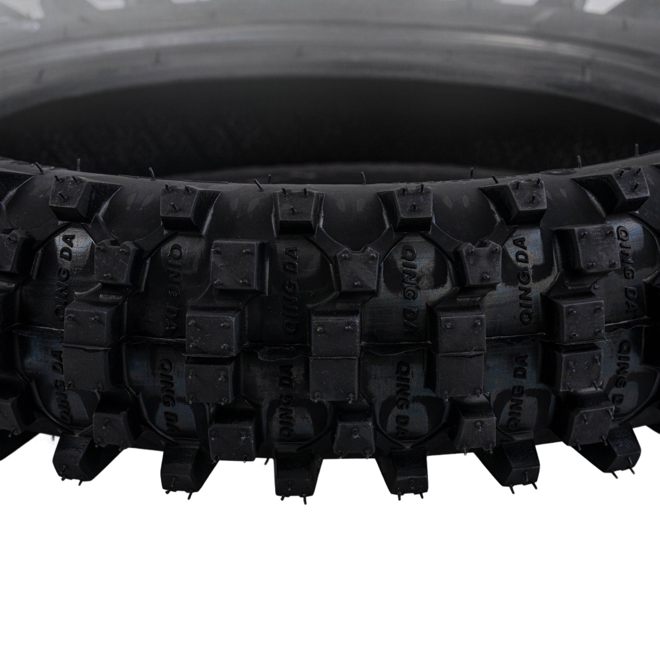 Close-up of a 3.00-10 Dirt Bike Tire with QD015 Knobby Tread, showing detailed tread pattern designed for mini dirt bikes, ideal for 49cc/50cc & 70cc models.