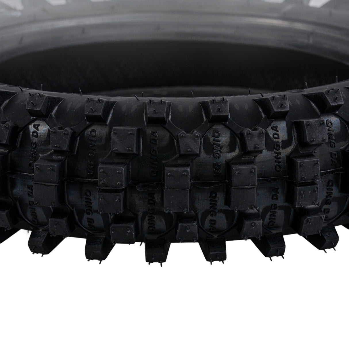 Close-up of a 3.00-10 Dirt Bike Tire with QD015 Knobby Tread, showing detailed tread pattern designed for mini dirt bikes, ideal for 49cc/50cc & 70cc models.