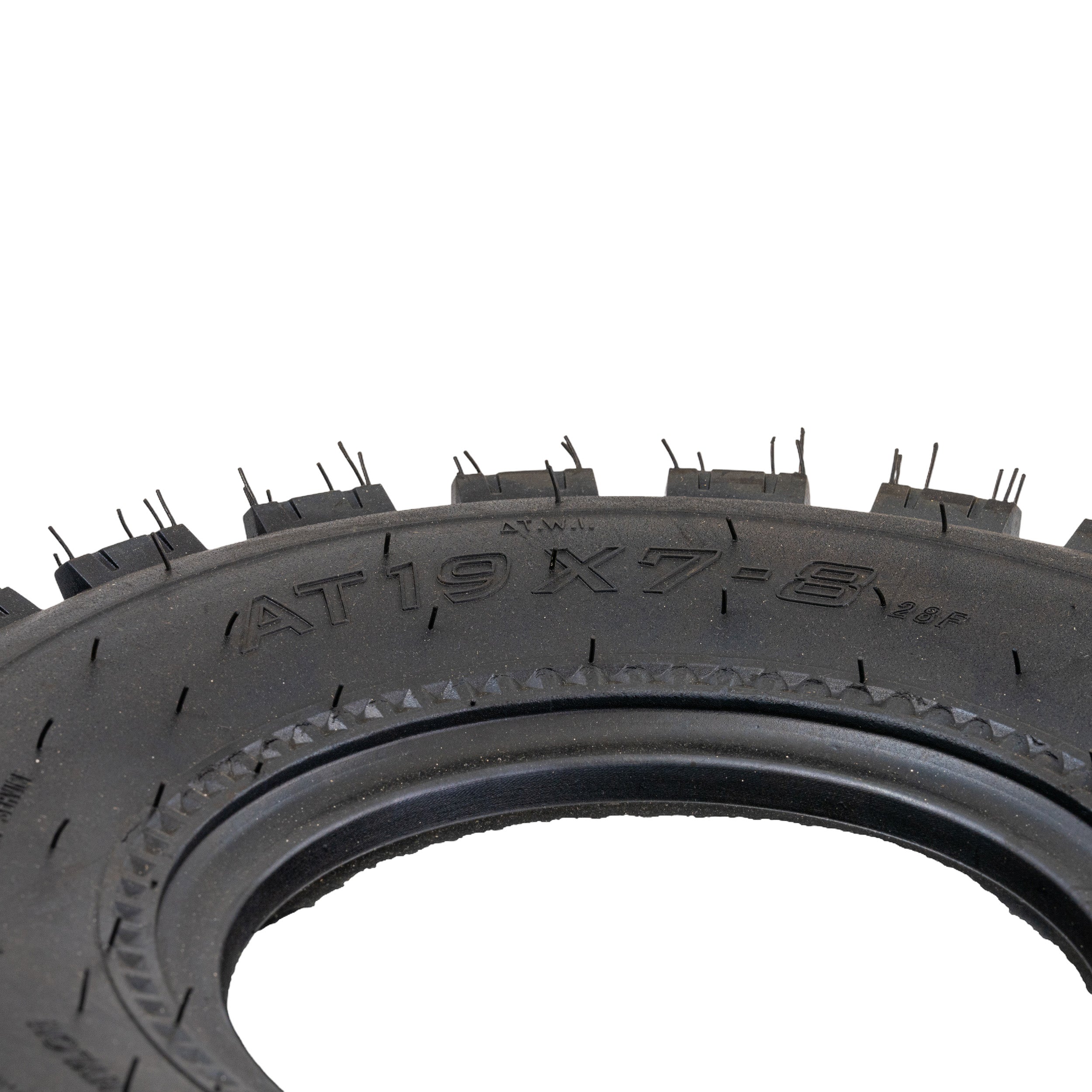 Close-up of the 19x7-8 front tire for Coleman AT125-EX & AT125-UT ATVs, showcasing its aggressive knobby tread and tubeless pneumatic design, ideal for soft and wet terrain.