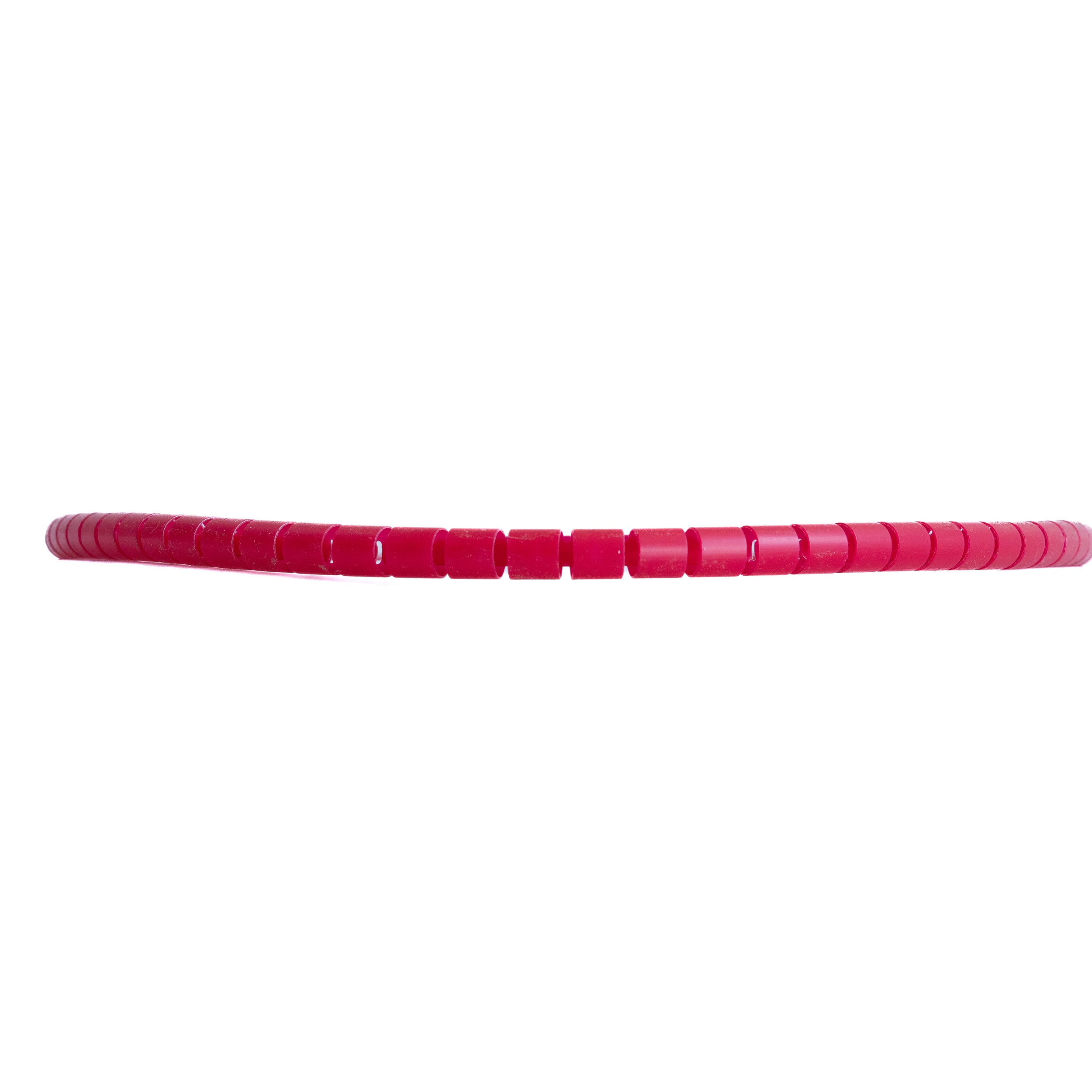 1 Meter Cable Protector shown coiled, highlighting its durable red plastic material for effective cable management in various settings.