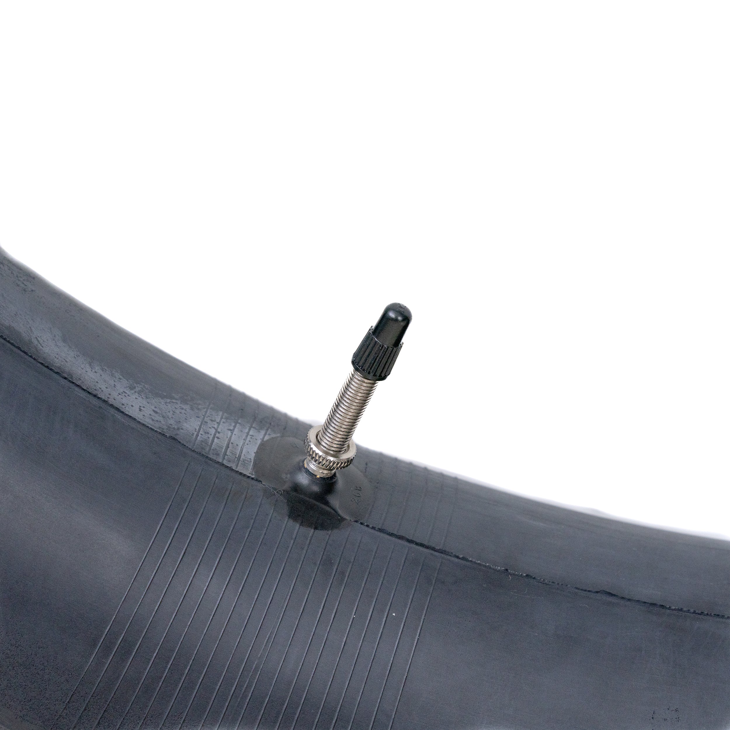 Close-up of a 26x4.5-4.8 Bicycle Inner Tube with 33mm Presta Valve, showcasing the tire's texture and valve detail.