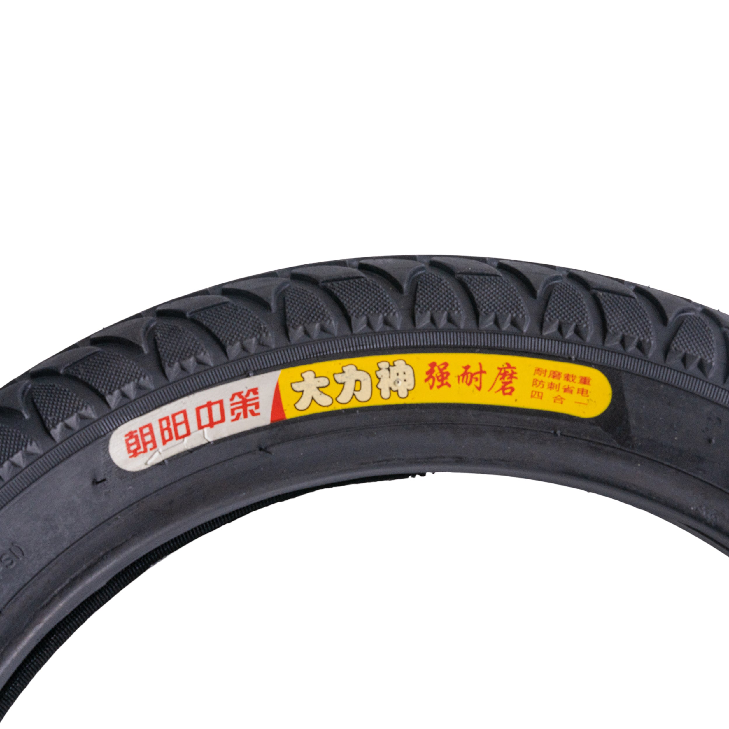 Close-up view of the 16X2.50-64-305 Tubeless Tire for E-Bikes & Scooters, showing the detailed tread pattern and a prominent yellow and red label on the tire.