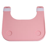 Plastic Tray Table for Wheelchairs: A durable pink plastic bib with two holes, designed for easy attachment to wheelchair armrests, providing a sturdy surface for various activities with a built-in cup holder.