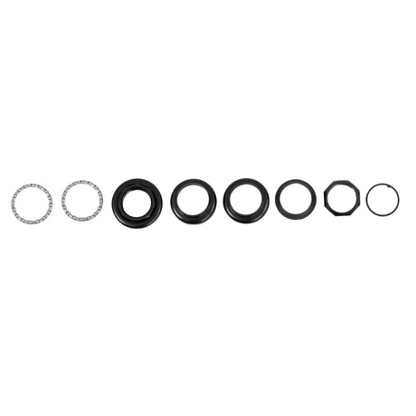 Tiller Bearing Set for ActiveCare & Drive Medical Pilot, Prowler, & Spitfire Scooters, & Titan Power Chairs: A row of black and silver round bearings, hex nut, and ball bearings displayed on a white background.