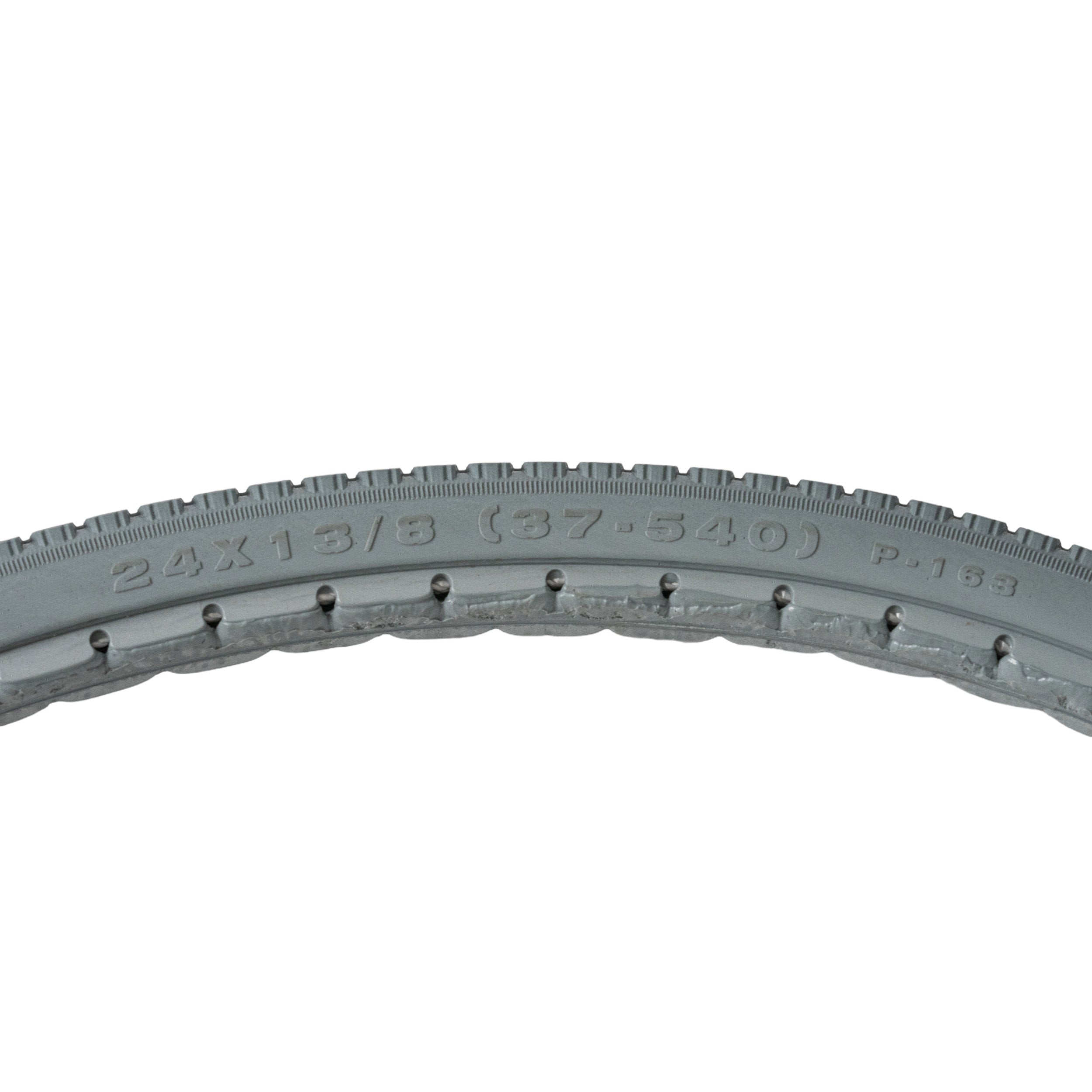 24x1-3/8 (37-540) Solid Urethane Orion Wheelchair Tire with P163 Street Tread (Primo), showcasing a curved tire with visible surface-gripping tread and writing, designed for manual wheelchairs.